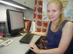 woman sitting at computer